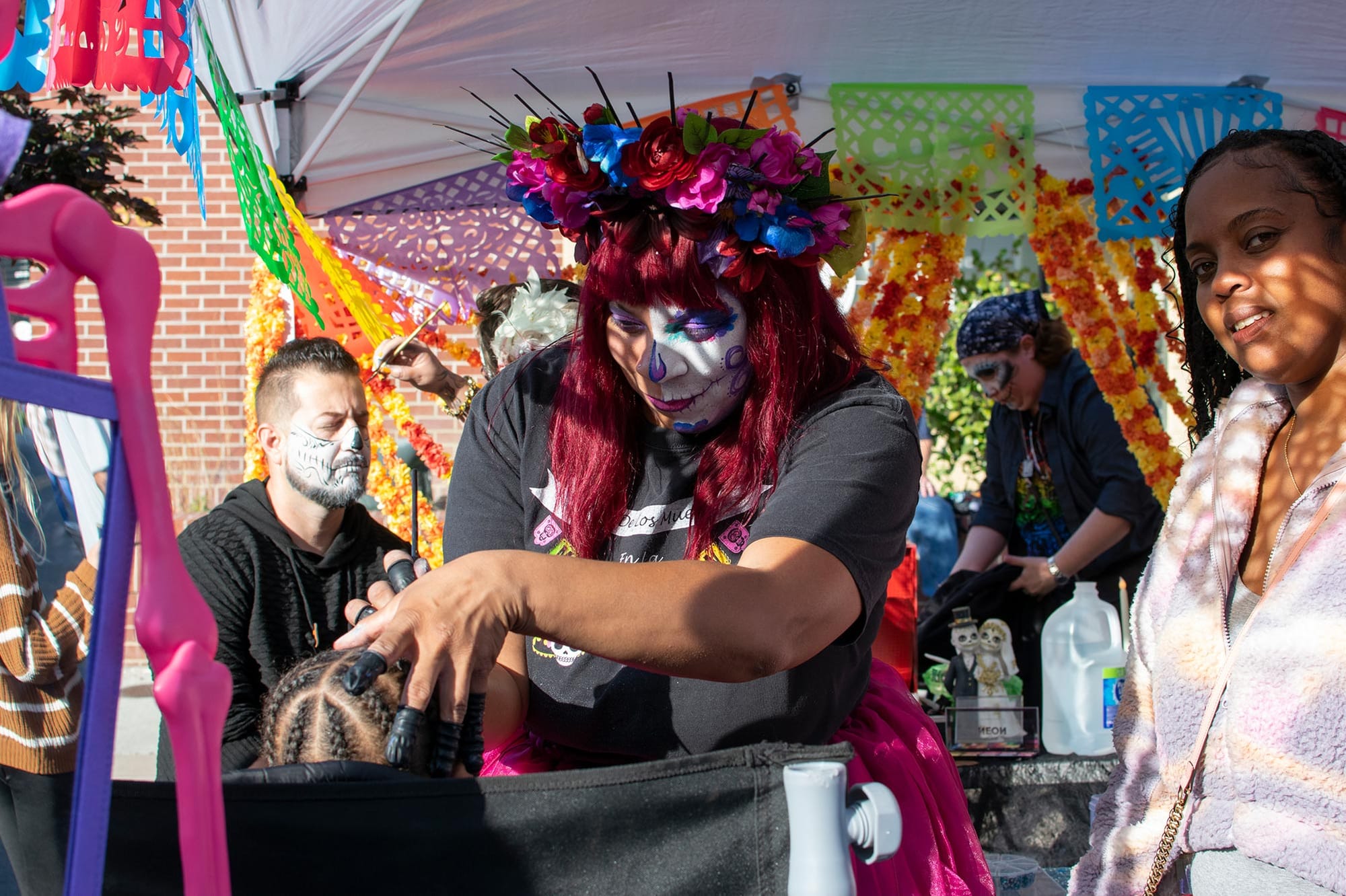 A face painting booth during the Dia de Los Muertos festival.